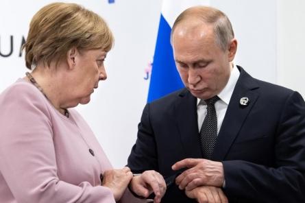 Меркель приехала к Путину за помощью