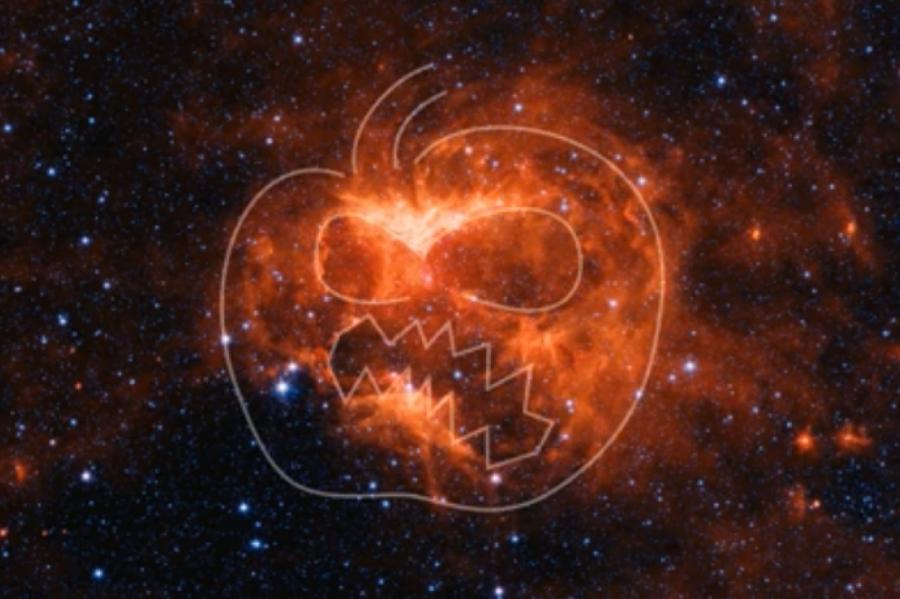 Телескоп Spitzer заснял на краю галактики жуткий символ Хеллоуина