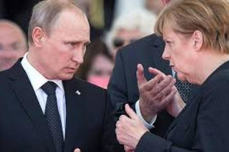 Путин обсудил с Меркель судьбу Украины