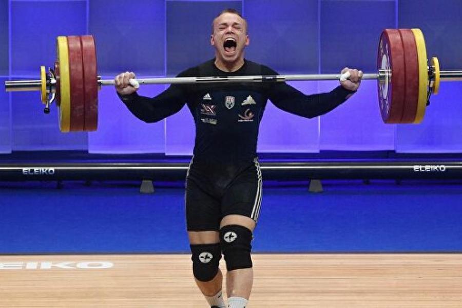 Латвийский тяжелоатлет Сухарев занял шестое место на Олимпиаде
