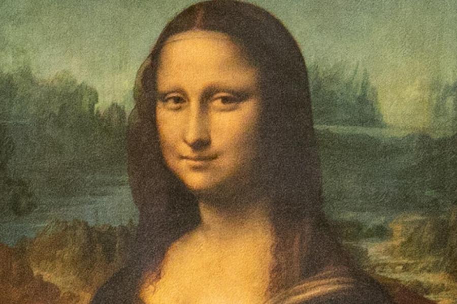 Неизвестный напал на "Мону Лизу" в парижском Лувре и испачкал картину тортом