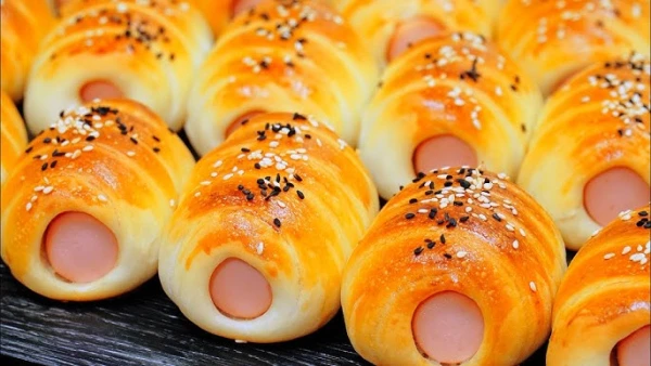 Изображение к статье: Быстро и вкусно: готовим сосиски в тесте «Компанейские»