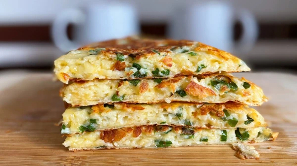 Изображение к статье: На все случаи: рецепт сырно-мясной лепешки