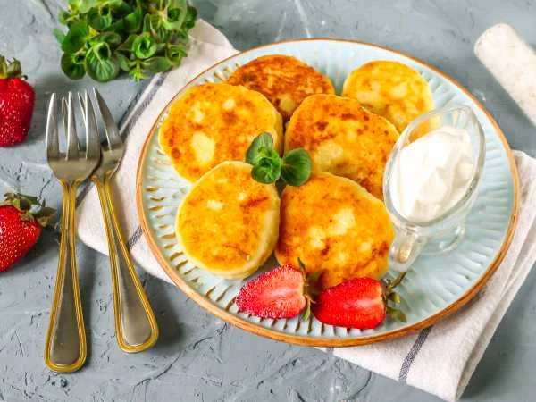 Изображение к статье: Как приготовить ароматные сырники с мандаринами: идеальный завтрак