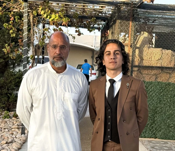 Саиф аль-Ислам Каддафи и Ахмед Каддафи.