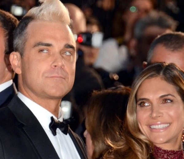 Изображение к статье: Робби Уильямс продал больше всего альбомов на территории Великобритании, а также получил больше всего BRIT Awards за всю историю премии.