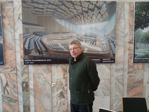 Изображение к статье: Дирижер Олари Элтс на фоне картинки-визуализации нового концертного зала, который будет построен на месте Дома конгрессов.