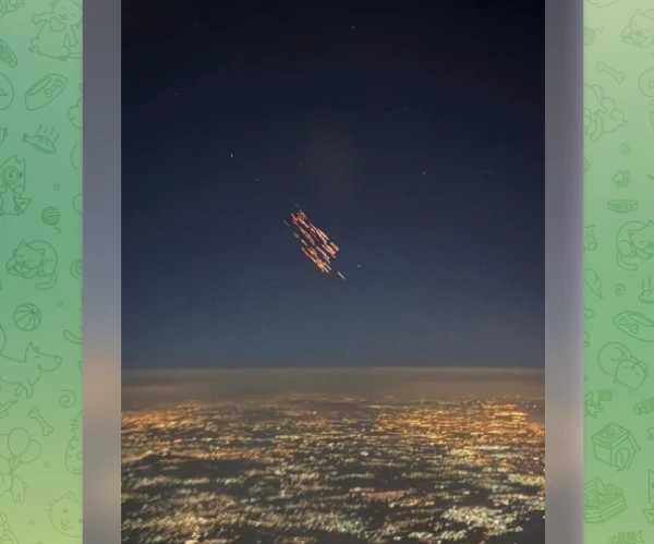 Изображение к статье: Иранский «огненный дождь» в небе над Израилем сняли из кабины самолета