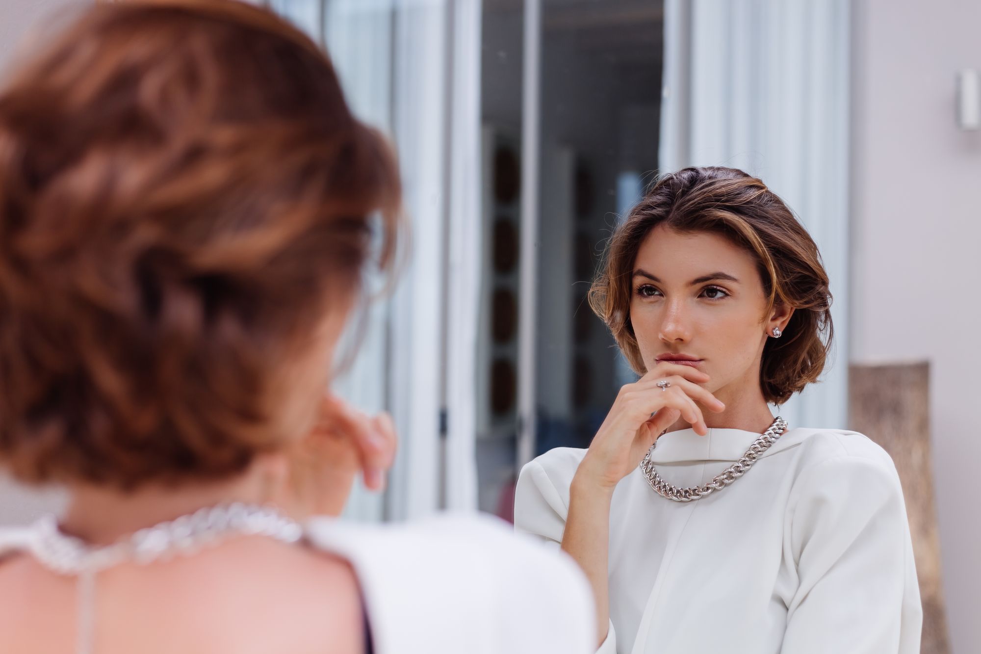 fashion-portrait-young-caucasian-woman-professional-model-white-blazer-silver-chain-look-mirror-luxury-villa.jpg