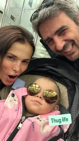 Sati Kazanova and Stefano Tiozzo with their daughter
