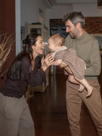 Sati Kazanova and Stefano Tiozzo with their daughter