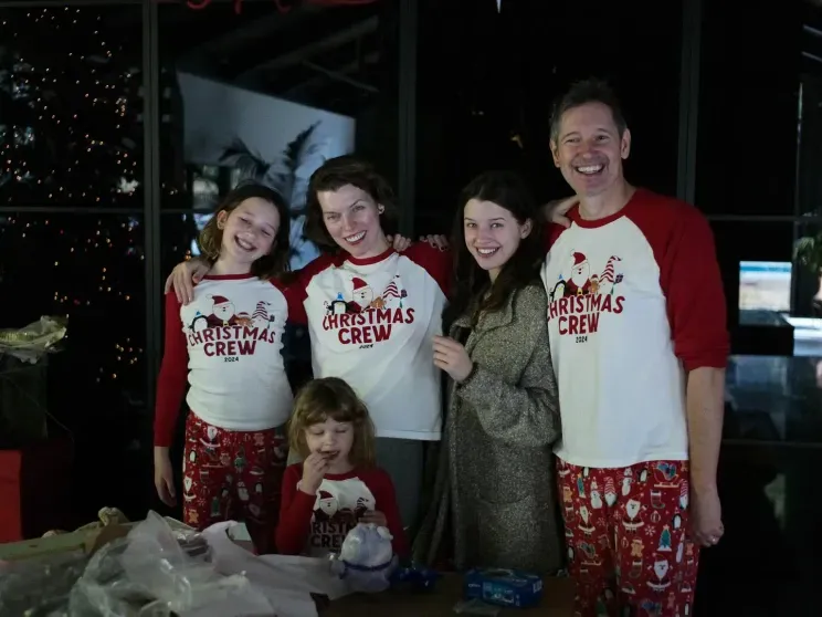 Milla Jovovich with Her Husband and Daughters