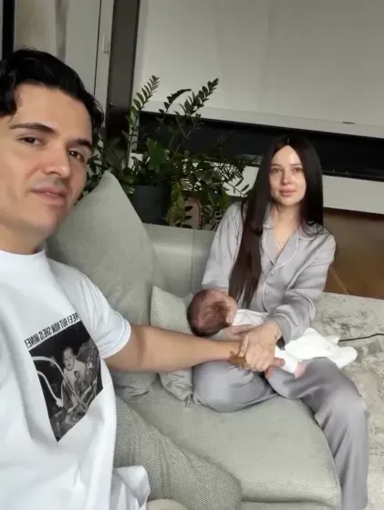 Lerchek and Luis Squicciarini with son